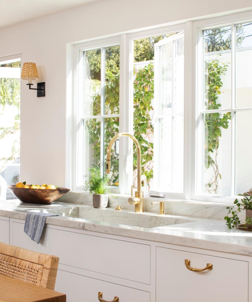 Gold sink and taps, marble sink