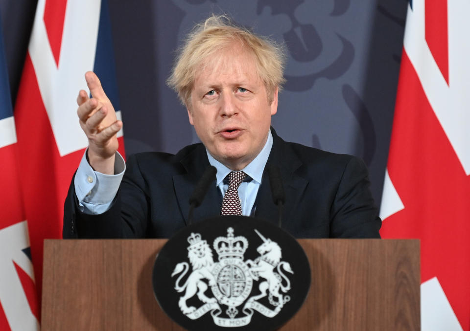 Britain's Prime Minister Boris Johnson speaks during a media briefing in Downing Street, London, Thursday, Dec. 24, 2020. Britain and the European Union have struck a provisional free-trade agreement that should avert New Year's chaos for cross-border commerce and bring a measure of certainty to businesses after years of Brexit turmoil. The breakthrough on Thursday came after months of tense and often testy negotiations that whittled differences down to three key issues: fair-competition rules, mechanisms for resolving future disputes and fishing rights. (Paul Grover/Pool Photo via AP)