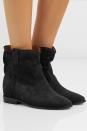 <p><strong>Isabel Marant </strong></p><p>net-a-porter.com</p><p><strong>$680.00</strong></p><p>It doesn't get much more effortlessly undone and French than Isabel Marant's Crisi booties. And for those who like a little extra height from their shoes: fear not, these have an interior wedge heel for just a smidge more lift. </p>