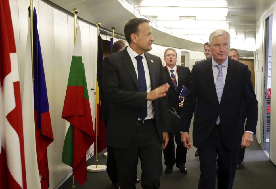 European Union chief Brexit negotiator Michel Barnier, right, speaks with Irish Prime Minister Leo Varadkar prior to a meeting on the sidelines of an EU summit in Brussels, Thursday, June 20, 2019. European Union leaders meet in Brussels for a two-day summit to begin the process of finalizing candidates for the bloc's top jobs. (AP Photo/Olivier Matthys, Pool)