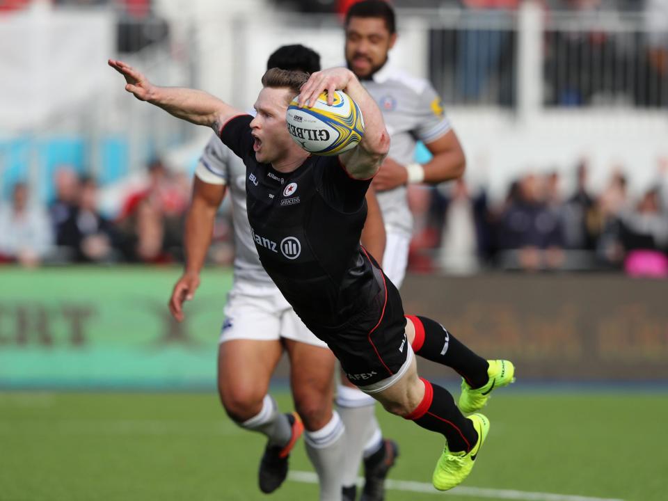 `Ashton celebrated his second try with his signature splash: Getty