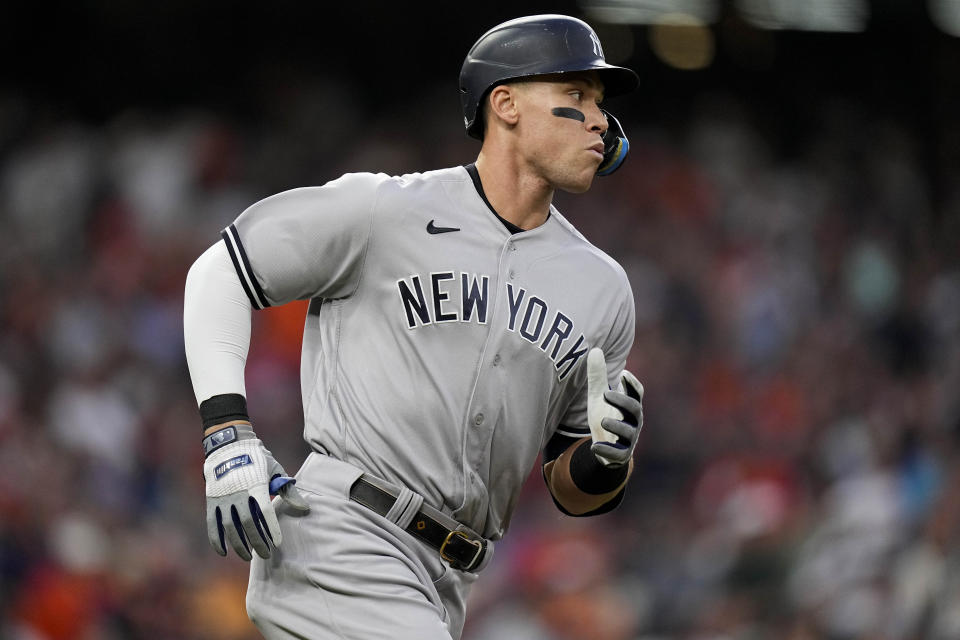 New York Yankees Aaron Judge (99) watches his ball fly out during the first inning in Game 2 of baseball's American League Championship Series between the Houston Astros and the New York Yankees, Thursday, Oct. 20, 2022, in Houston. (AP Photo/Eric Gay)