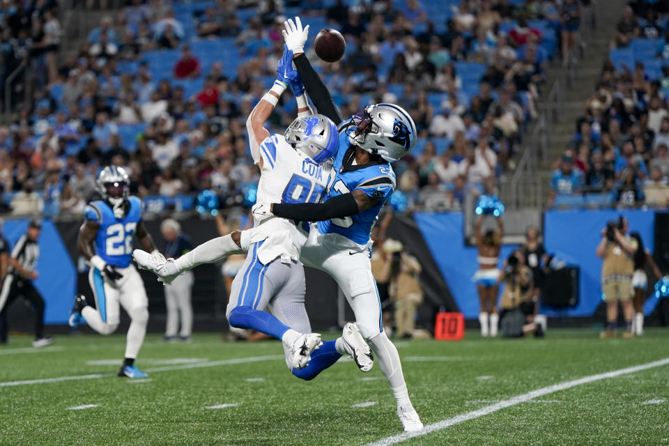 Carolina Panthers cornerback CJ Henderson breaks up a pass intended for Detroit Lions wide receiver Chase Cota during the first half of a preseason NFL football game Friday, Aug. 25, 2023, in Charlotte, N.C. (AP Photo/Erik Verduzco)