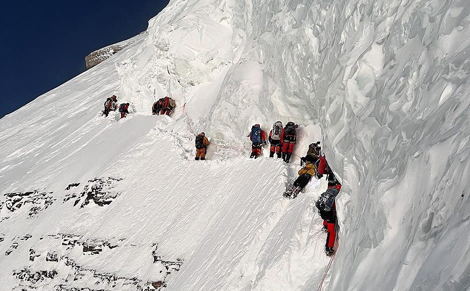 Climbers reportedly did not stop to help, sparking calls for better care of Sherpas