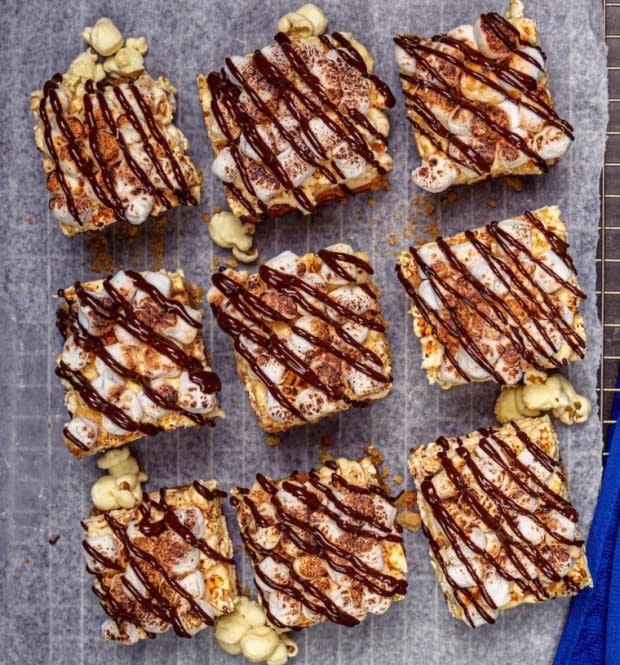 <p>Smartfood</p><p>The perfect sweet and salty caramel-flavored snack. </p><p><strong>Get the recipe:<a href="https://parade.com/1182907/parade/gimme-smore-popcorn-bars/" rel="nofollow noopener" target="_blank" data-ylk="slk:S'more Popcorn Bars;elm:context_link;itc:0;sec:content-canvas" class="link "> S'more Popcorn Bars</a></strong></p>