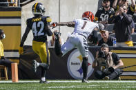 Cincinnati Bengals wide receiver Ja'Marr Chase (1) makes a catch past Pittsburgh Steelers cornerback James Pierre (42) and takes the ball in for a touchdown during the first half an NFL football game, Sunday, Sept. 26, 2021, in Pittsburgh. (AP Photo/Gene J. Puskar)