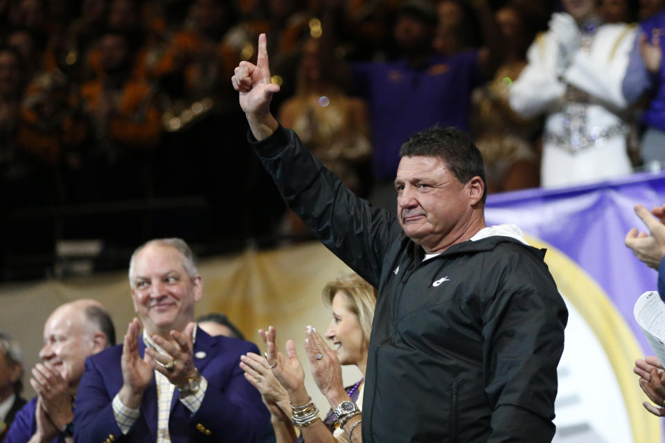 LSU head coach Ed Orgeron acknowledges the crowd during a celebration of their NCAA college football championship, Saturday, Jan. 18, 2020, on the LSU campus in Baton Rouge, La. (AP Photo/Gerald Herbert)