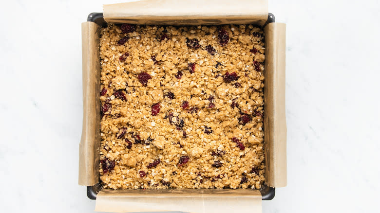 Cranberry oat bar in baking pan