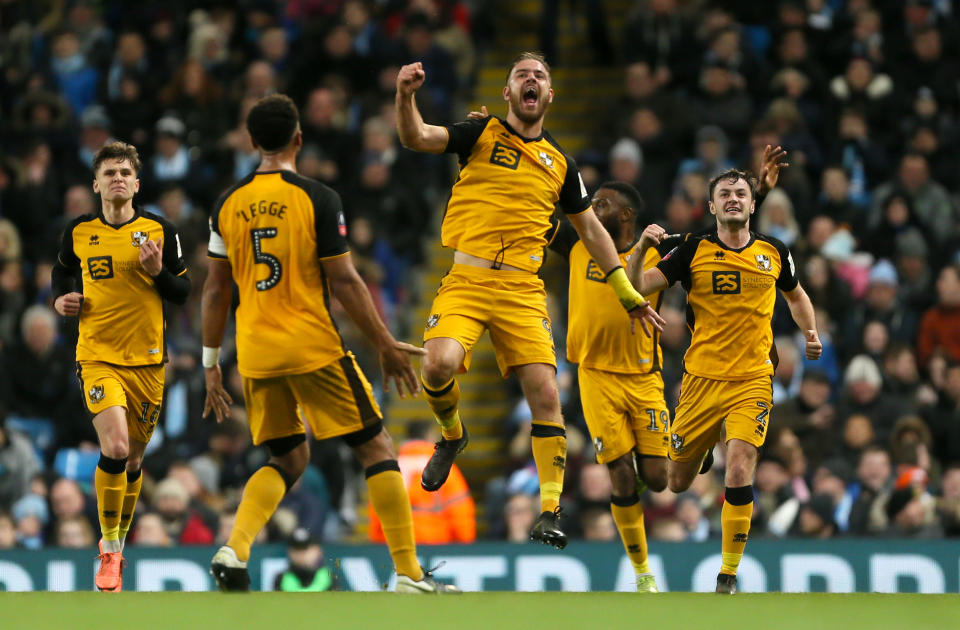 Port Vale's Tom Pope celebrates scoring his side's first goal of the game. (Credit: Getty Images)