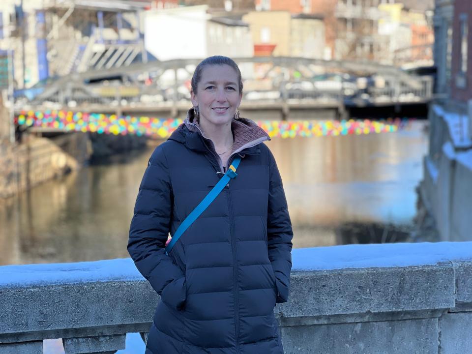 Katie Trautz, executive director of Montpelier Alive, on the streets of Montpelier Dec. 15, 2023. Her organization was instrumental helping downtown businesses get resources and reopen following devastating flooding from July 2023.