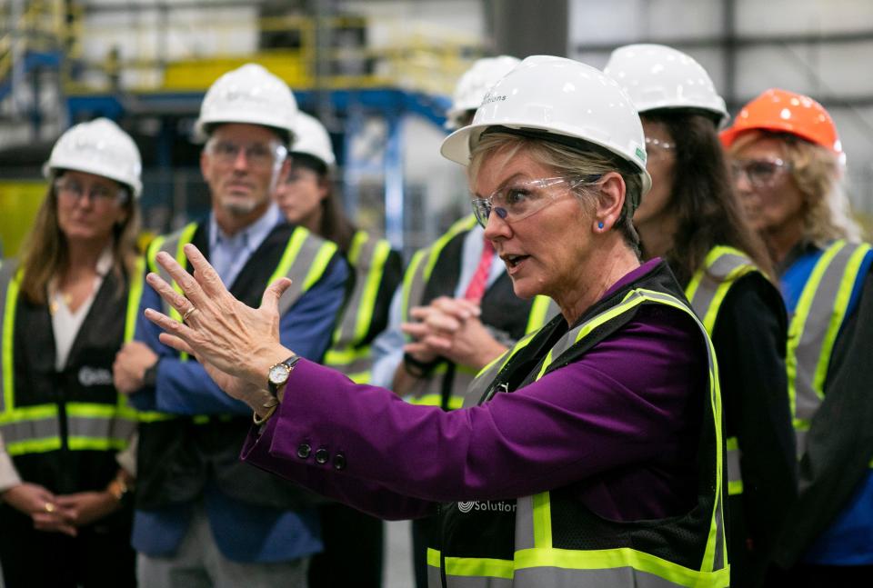 United States Secretary of Energy Jennifer Granholm talks with the Chief Operations Officer John Kelly as they look at a variety electric batteries that can be recycled inside of Cirba Solutions US Inc. Lancaster.
