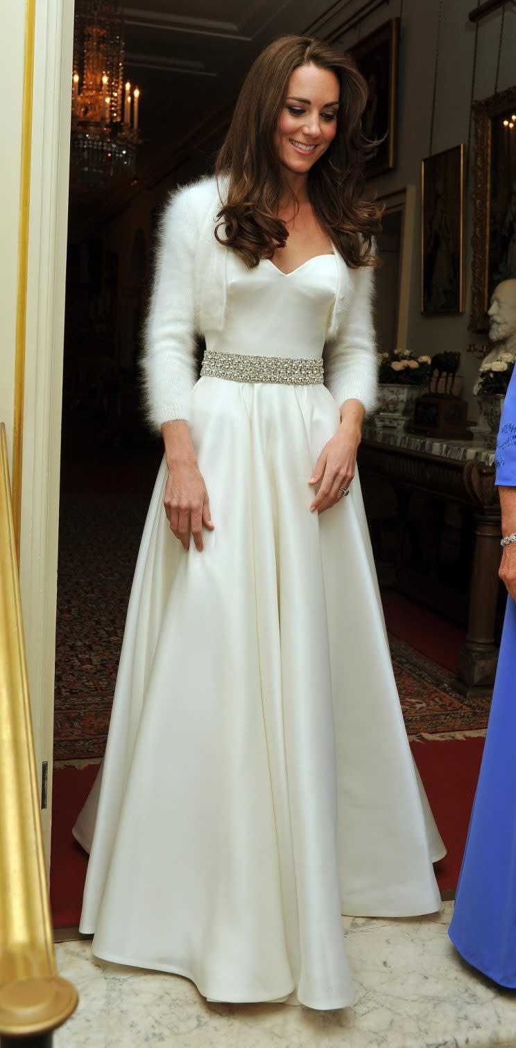 <i>The Duchess changed out of her wedding gown for the evening reception [Photo: PA]</i>