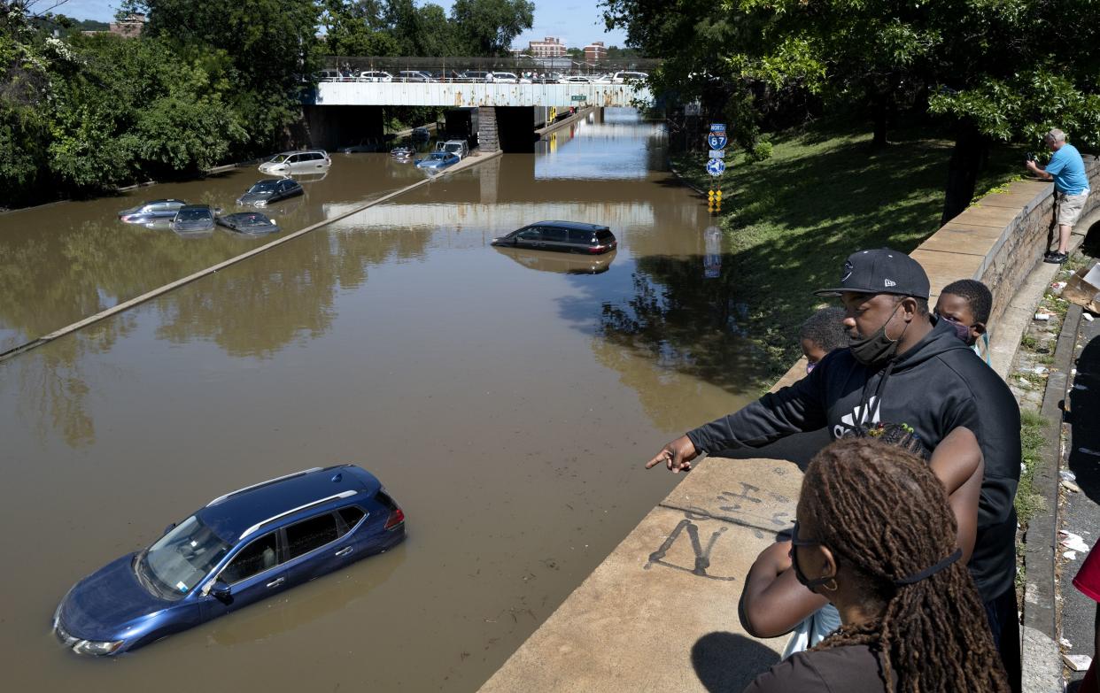 Cars and trucks are stranded by high water Thursday, Sept 2, 2021, on the Major Deegan Expressway in Bronx borough of New York as high water left behind by Hurricane Ida still stands on the highway hours later.