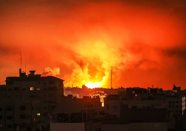 GAZA STRIP, GAZA - OCTOBER 27: Smoke rises and billows in different regions of Gaza as the Israeli army conducts the most intense air attacks on the 21st day in Gaza Strip, Gaza on October 27, 2023. Due to Israel cutting off electricity and not allowing fuel supplies, Gaza was plunged into darkness, and the sky was frequently illuminated by the bombs being dropped by Israeli aircraft. (Photo by Ali Jadallah/Anadolu via Getty Images)