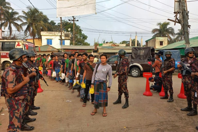 Myanmar nationals who fled across the border into Bangladesh to escape attacks on frontier outposts are sent home from Cox's Bazar (-)