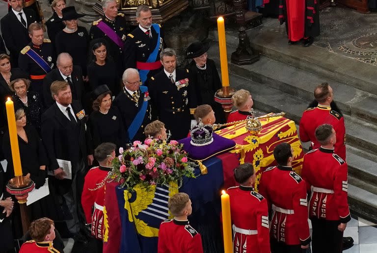 Sofia and Juan Carlos I of Spain with King Felipe VI of Spain and Queen Letizia of Spain as the coffin is placed near the altar at the state funeral of Queen Elizabeth II, held at Westminster Abbey