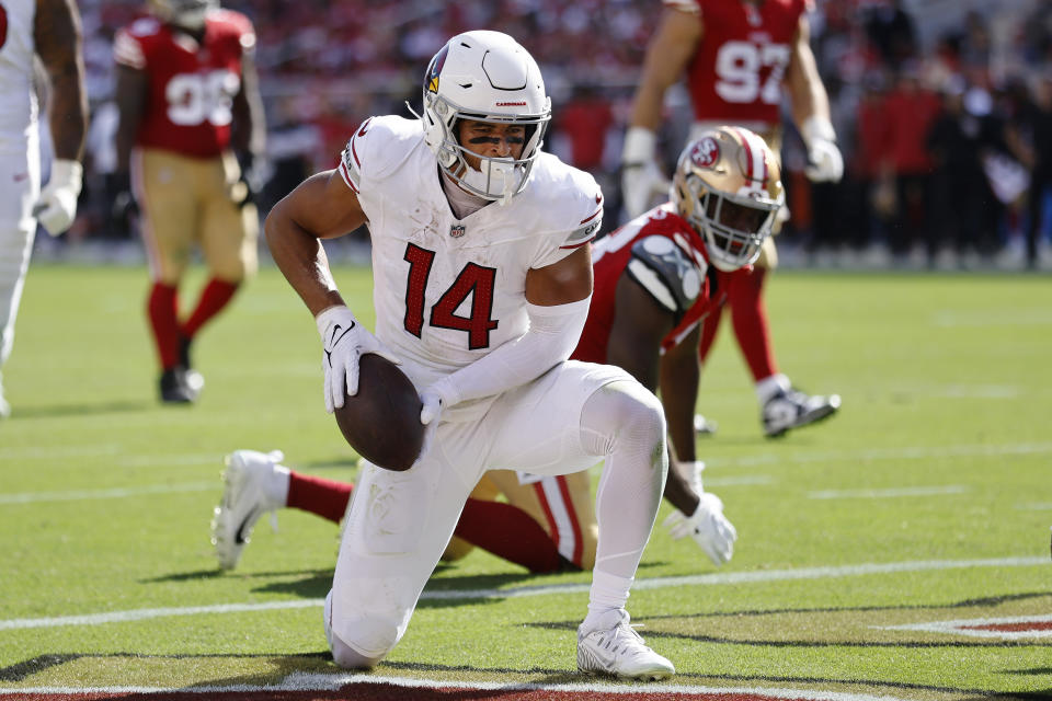 Arizona Cardinals wide receiver Michael Wilson (14) celebrates after scoring against the San Francisco 49ers during the second half of an NFL football game in Santa Clara, Calif., Sunday, Oct. 1, 2023. (AP Photo/Josie Lepe)
