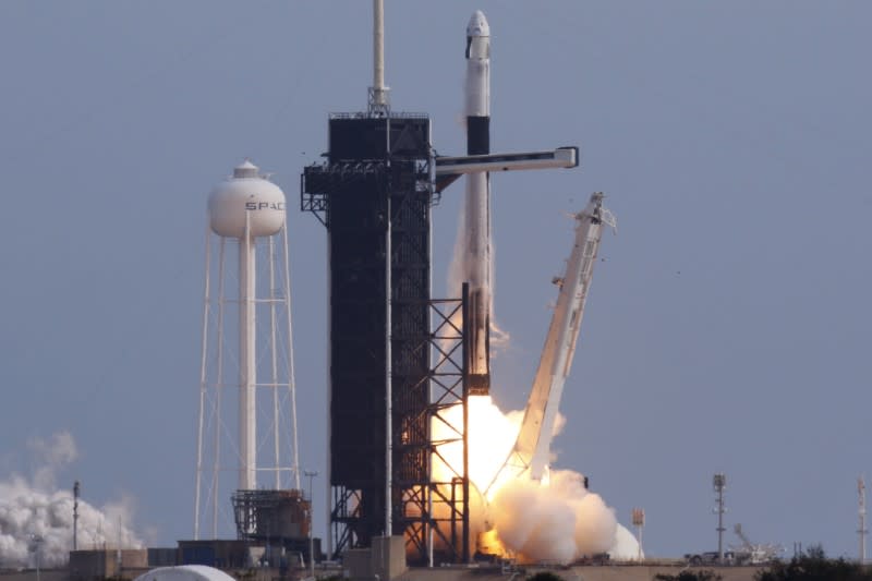 A SpaceX Falcon 9 rocket, carrying the Crew Dragon astronaut capsule, lifts off on an in-flight abort test from the Kennedy Space Center in Cape Canaveral