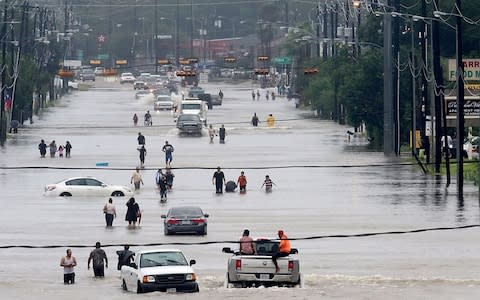 The scene in Telephone Road, Houston - Credit: AFP