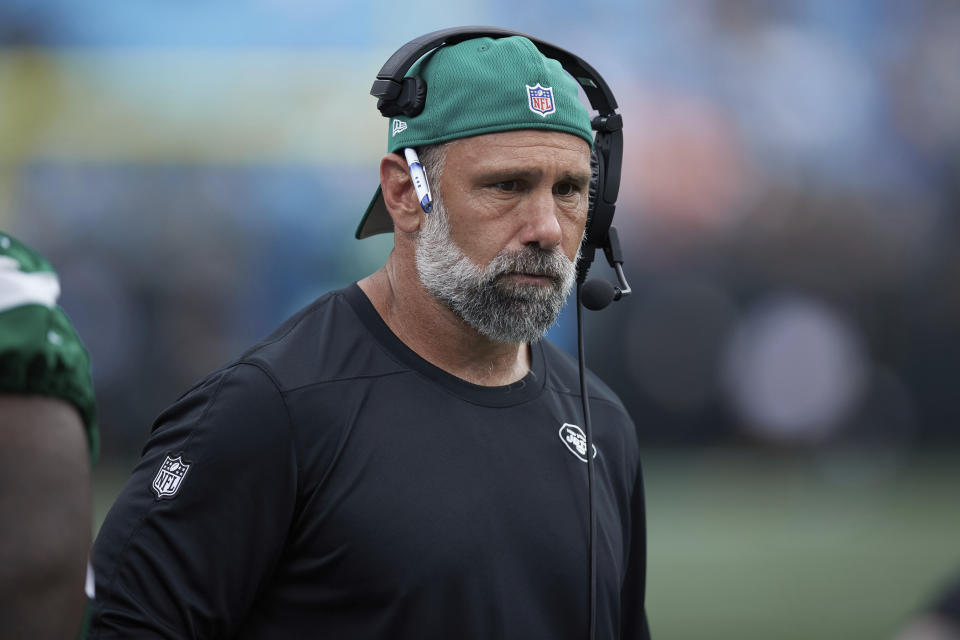 FILE - New York Jets defensive coordinator Jeff Ulbrich walks the sideline during an NFL preseason football game against the Carolina Panthers, Saturday, Aug. 12, 2023, in Charlotte, N.C. Tennessee Titans defensive line coach Terrell Williams and New York Jets defensive coordinator Jeff Ulbrich will serve as head coaches at the Senior Bowl. (AP Photo/Brian Westerholt, File)