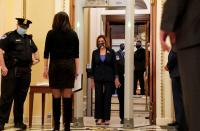 U.S. House Speaker Nancy Pelosi (D-CA) walks through a new metal detector outside the House chamber as the House prepares to vote on a resolution demanding Vice President Pence and the cabinet remove President Trump from office, at the U.S. Capitol