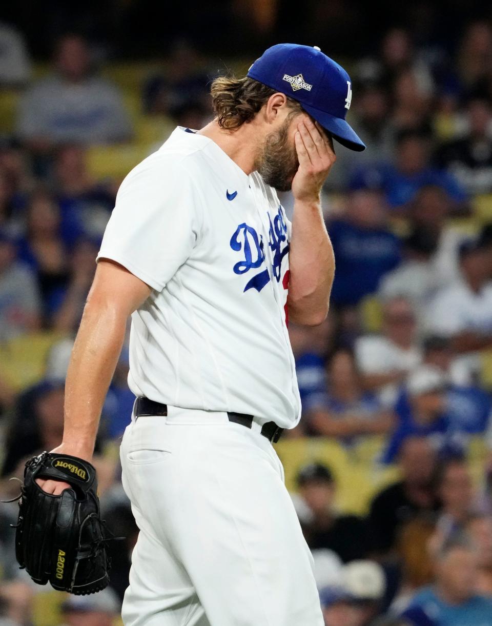 Los Angeles Dodgers starting pitcher Clayton Kershaw (22) reacts after allowing the Arizona Diamondbacks to score six runs in the first inning during Game 1 of the NLDS at Dodger Stadium in Los Angeles on Oct. 7, 2023.