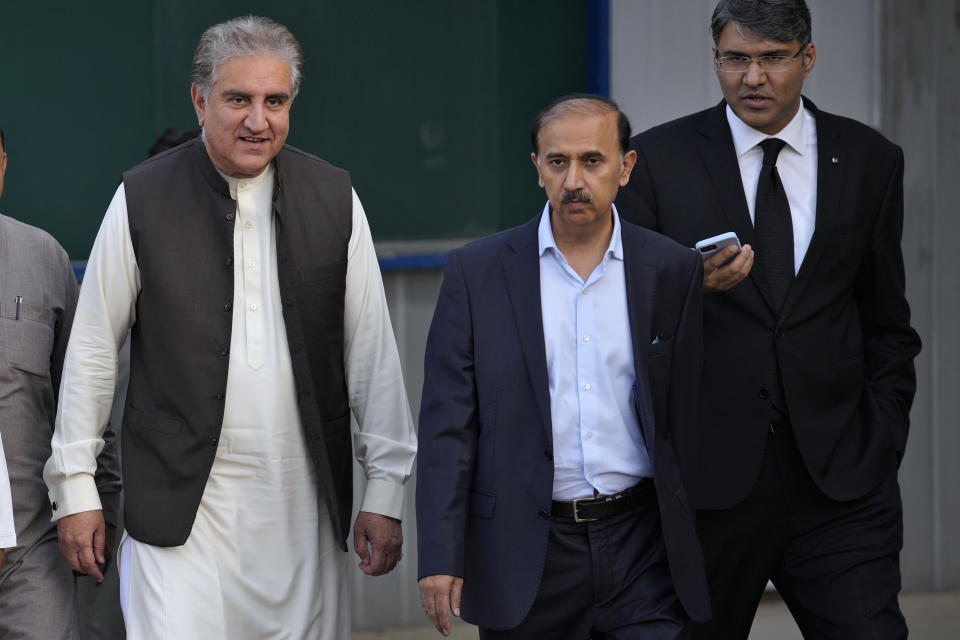 Shah Mahmood Qureshi, a top leader of Pakistan's former Prime Minister Imran Khan's 'Pakistan Tehreek-e-Insaf' party, arrives with Khan' legal team for a press conference in Islamabad, Pakistan, Monday, Aug. 7, 2023. Khan is now an inmate at a high-security prison after being convicted of corruption and sentenced to three years. (AP Photo/Anjum Naveed)
