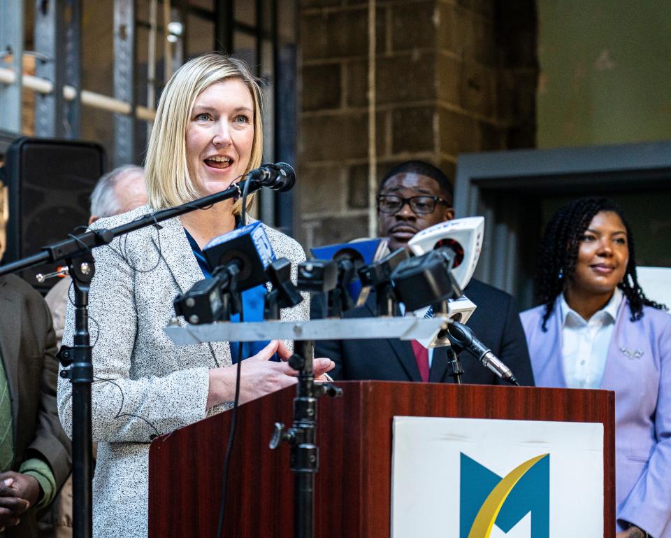 Lindsey St. Arnold Bell, Executive Director of Near West Side Partners/BID #10, speaks at the signing off of the 2024 budget at Concordia 27, a mixed-use space which will include affordable housing units, a community gathering space, a commercial kitchen, and business incubator, on Wednesday November 15, 2023 in Milwaukee, Wis.