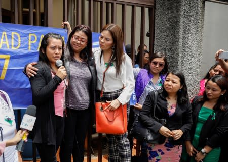 Evelyn Hernandez, who was sentenced to 30 years in prison for a suspected abortion, talks to the media after being absolved at a hearing in Ciudad Delgado