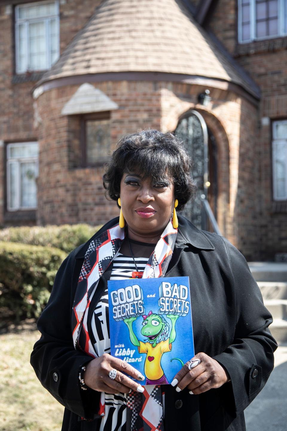 Toni McMorris, author of "Good Secrets and Bad Secrets with Libby the Lizard," at her home in Detroit on Tuesday, March 21, 2023.