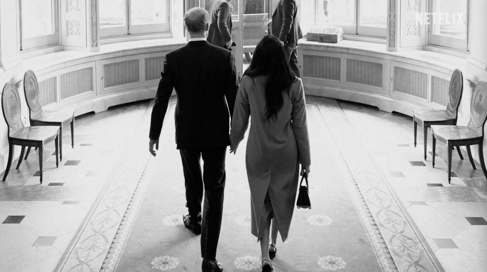 Harry and Meghan exit the Goring Hotel in their final days as working royals.