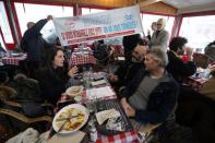 A restaurant in the French Riviera city of Nice opens for lunch in defiance of nationwide COVID-19 rules