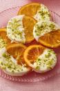 <p>These candied oranges are a sweet, light treat after a heavy meal.</p><p>Get the <strong><a href="https://www.womansday.com/food..." rel="nofollow noopener" target="_blank" data-ylk="slk:Chocolate Pistachio Orange Slices recipe.;elm:context_link;itc:0;sec:content-canvas" class="link ">Chocolate Pistachio Orange Slices recipe. </a></strong></p>