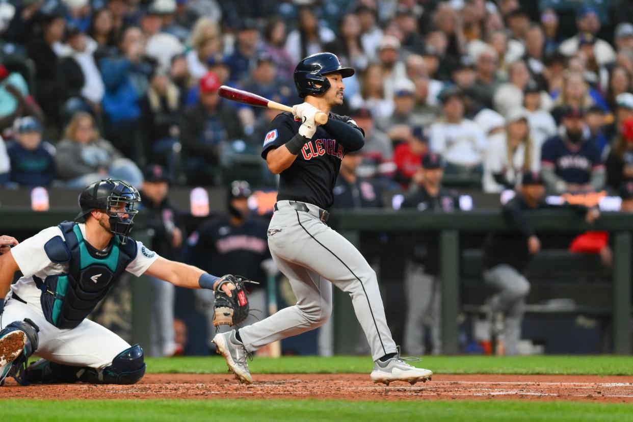 Cleveland Guardians left fielder Steven Kwan (38) hits into a force out that scores a run Monday against the Seattle Mariners in Seattle, Wash.