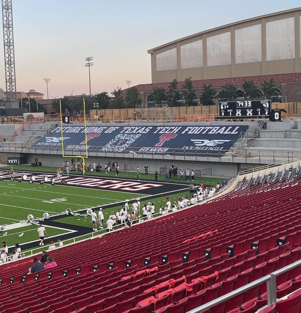 The south end zone of Jones AT&T Stadium, shown Thursday evening with the sponsor banner in the construction area of the south end zone complex. The four-level building is scheduled for completion before the 2024 season.