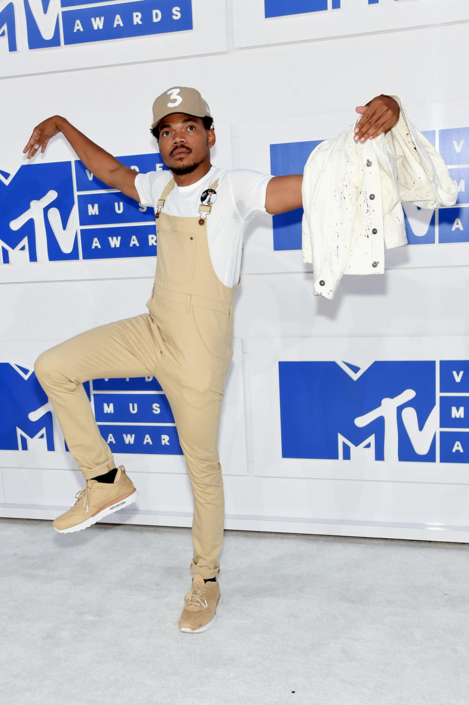 Chance the Rapper wearing a “very cheap white tee” and Nike AirMax sneakers.