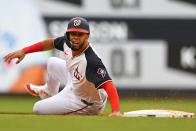 Washington Nationals' Luis García Jr. is safe after stealing second base during the first inning of a baseball game against the Toronto Blue Jays, Sunday, May 5, 2024, in Washington. (AP Photo/John McDonnell)