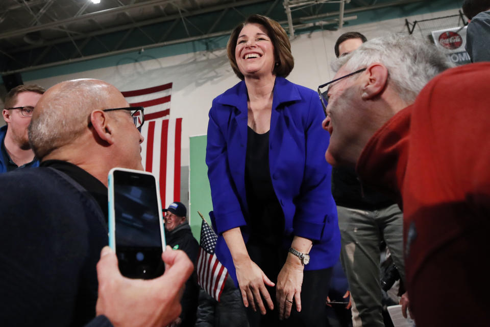 Democratic presidential candidate Sen. Amy Klobuchar, D-Minn., laughs as she speaks to attendees at a campaign event, Sunday, Feb. 9, 2020, in Nashua, N.H. (AP Photo/Elise Amendola)