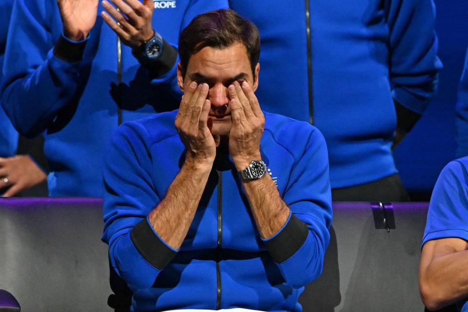 Switzerland's Roger Federer sheds a tear after playing his final match, a doubles with Spain's Rafael Nadal of Team Europe against USA's Jack Sock and USA's Frances Tiafoe of Team World in the 2022 Laver Cup at the O2 Arena in London, early on September 24, 2022. - Roger Federer brings the curtain down on his spectacular career in a "super special" match alongside long-time rival Rafael Nadal at the Laver Cup in London on Friday.