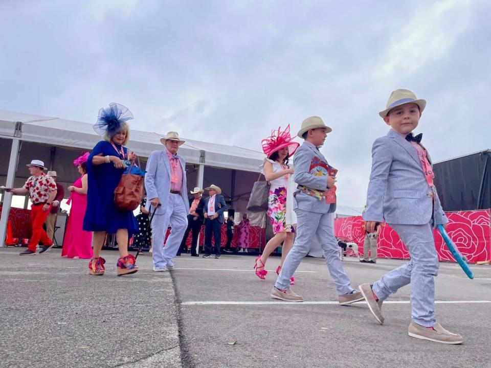 Fans enter the track on at Churchill Downs for the 150th Kentucky Derby on Saturday.