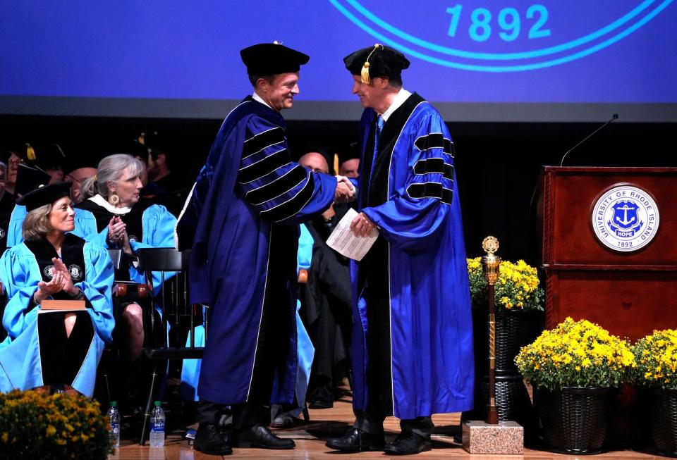 URI President Marc Parlange, left, is congratulated by Gov. Dan McKee during Parlange's inauguration at the Kingston campus on Thursday.