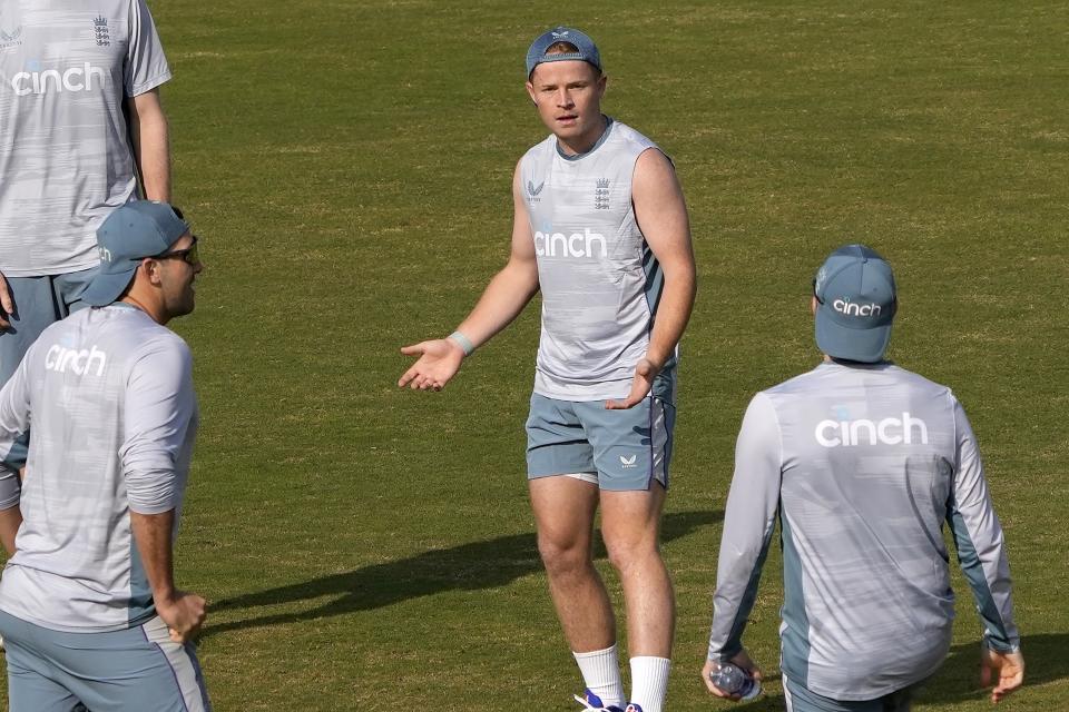 England's Ollie Pope, center, and teammates play with soccer ball during a training session, in Rawalpindi, Pakistan, Monday, Nov. 28, 2022. England's team arrived in Pakistan to play three-test cricket matches starting from Dec. 1. (AP Photo/Anjum Naveed)