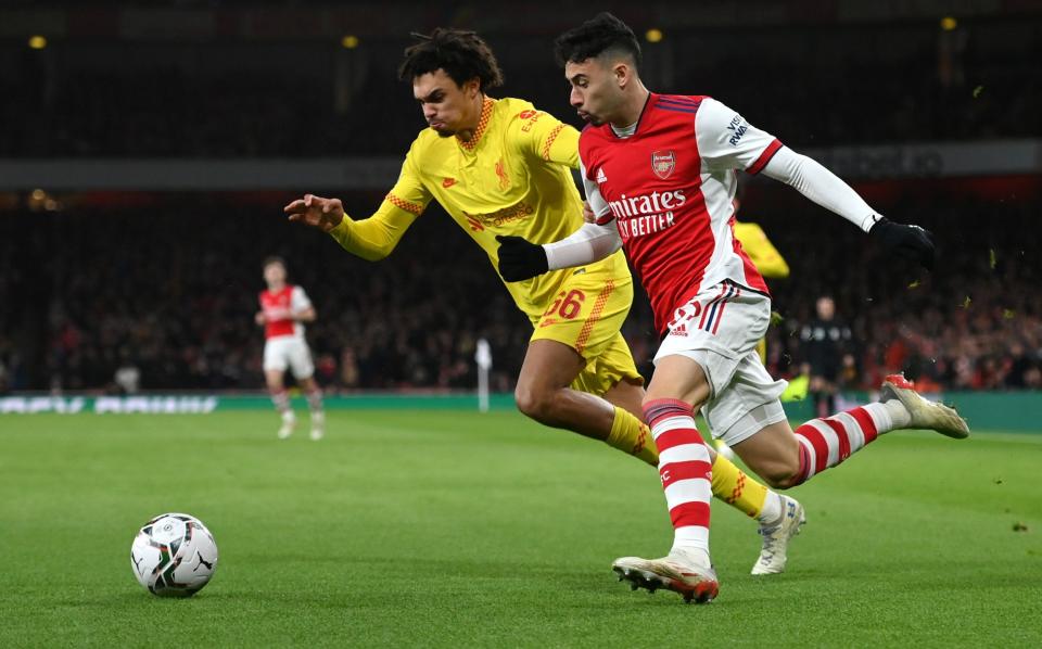 Jurgen Klopp said his right-back 'did outstandingly well' up against Arsenal forward Gabriel Martinelli - GETTY IMAGES