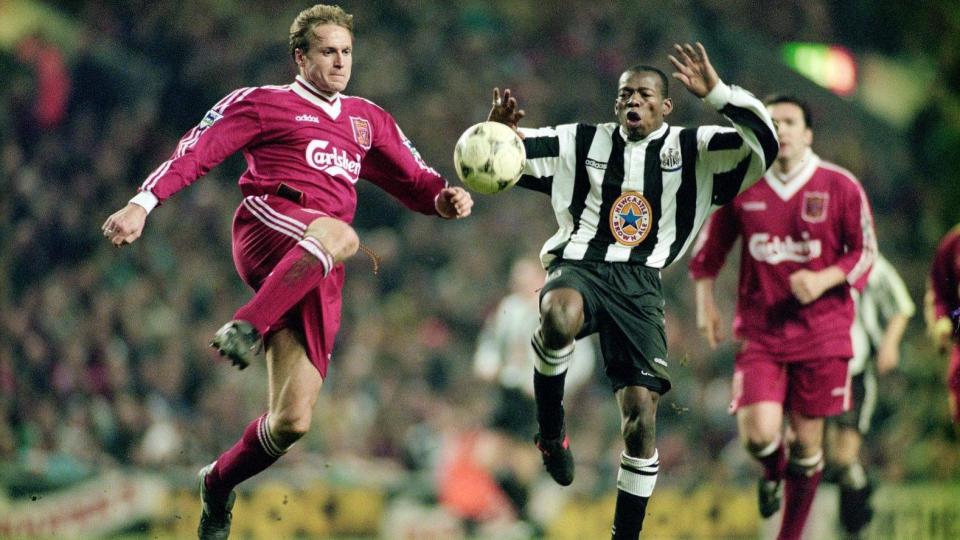 Liverpool's John Scales challenges Tino Asprilla of Newcastle