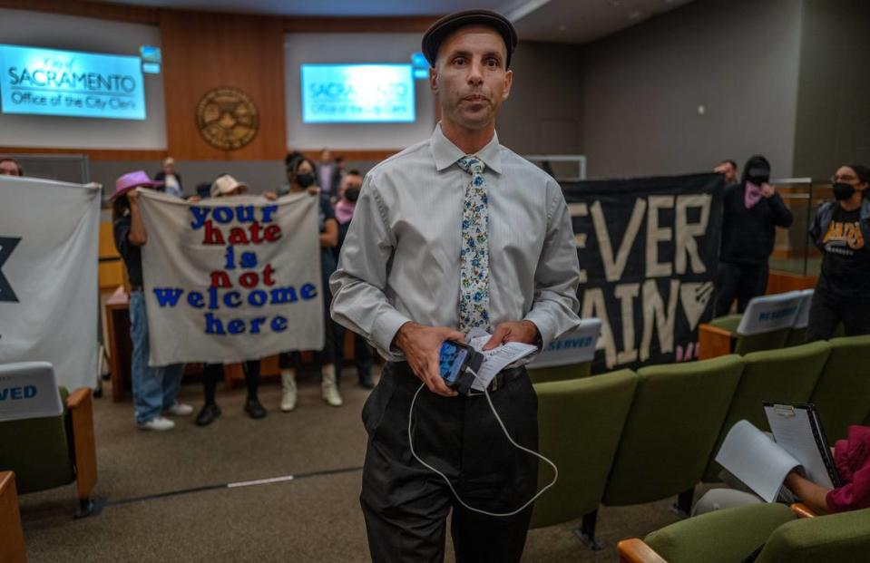 Ryan Messano attends a Sacramento City Council meeting in May 2023.