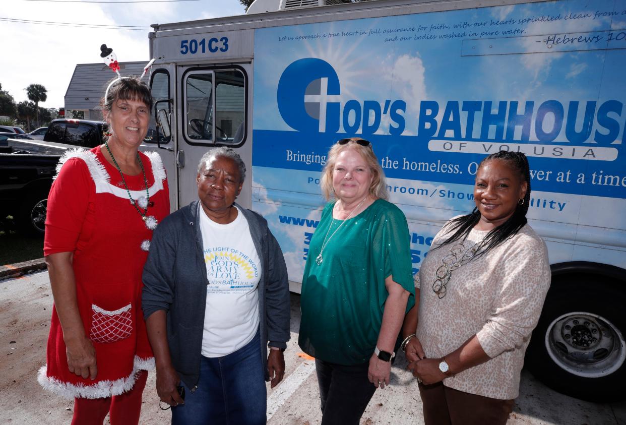New Smyrna Beach Housing Authority staff, along with God's Bath House volunteers (left to right) Donna Hinckle, Elizabeth Glass, Teresa Pope and Loriann Morris in New Smyrna Beach, Thursday, Dec. 22, 2022.