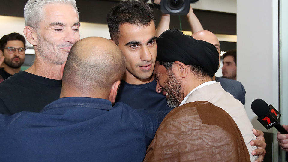 Hakeem al-Araibi is greeted by loved ones. (Photo by Scott Barbour/Getty Images)