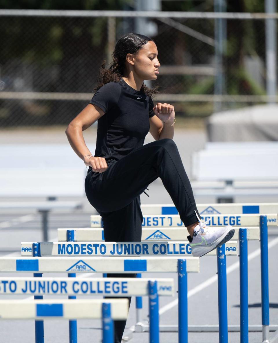 Sprinter Taylor Snaer warms up during practice at Modesto Junior College in Modesto, Calif., Tuesday, May 14, 2024.