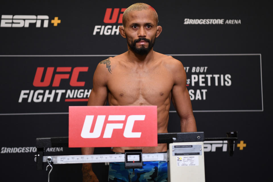 Deiveson Figueiredo of Brazil poses on the scale during the UFC Fight Night weigh-in at Hilton Franklin Cool Springs on March 22, 2019 in Franklin, Tennessee. (Photo by Jeff Bottari/Zuffa LLC/Zuffa LLC via Getty Images)