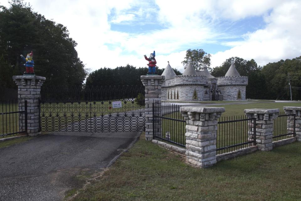 Rudy was a truck driver and told Ruth he would build her a castle one day, and sure enough, he did. The site cites Fulton County as its source.